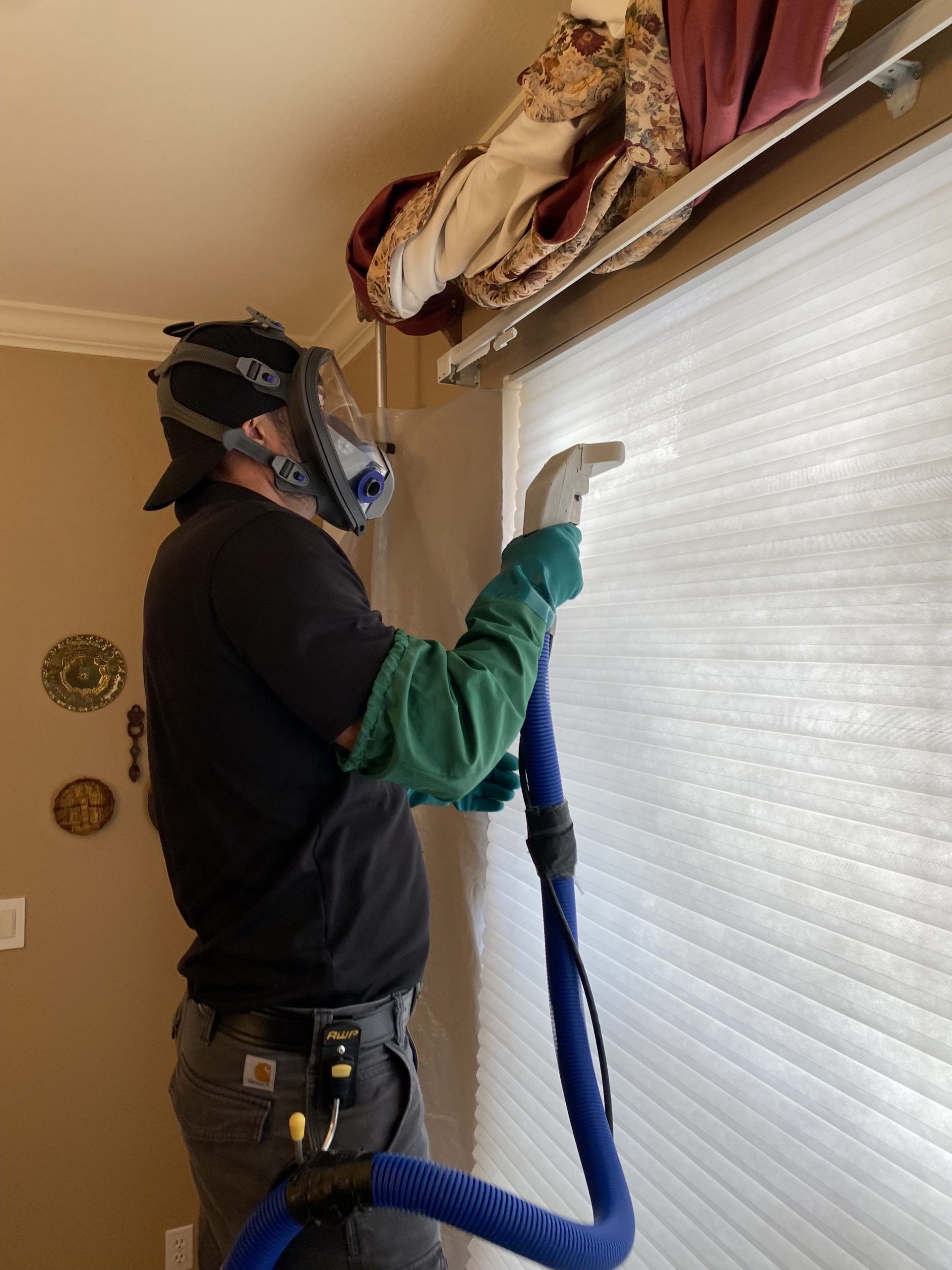 Man Cleaning Curtain